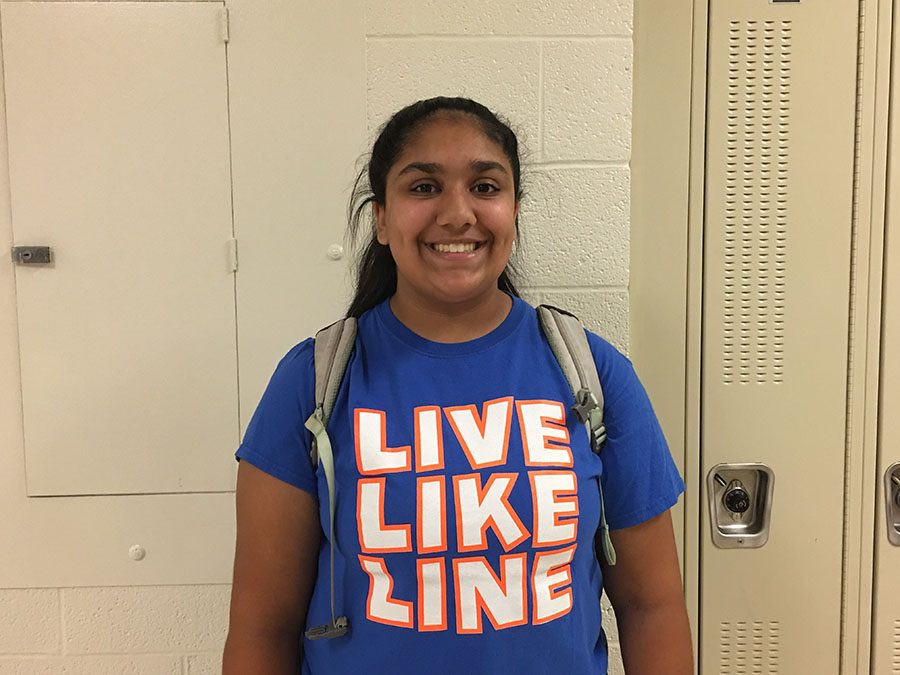 Raginya Handoo 19 poses in the hall for her photo on Monday, Sept. 24.