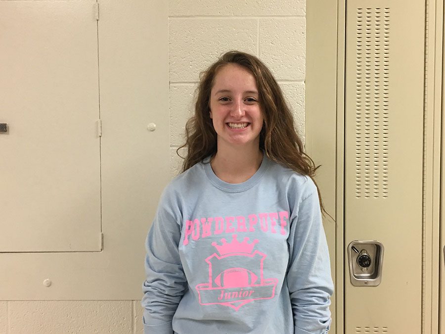 Madelyn Reid 19 stands in the hall and smiles for her portrait on Monday, Sept. 24.