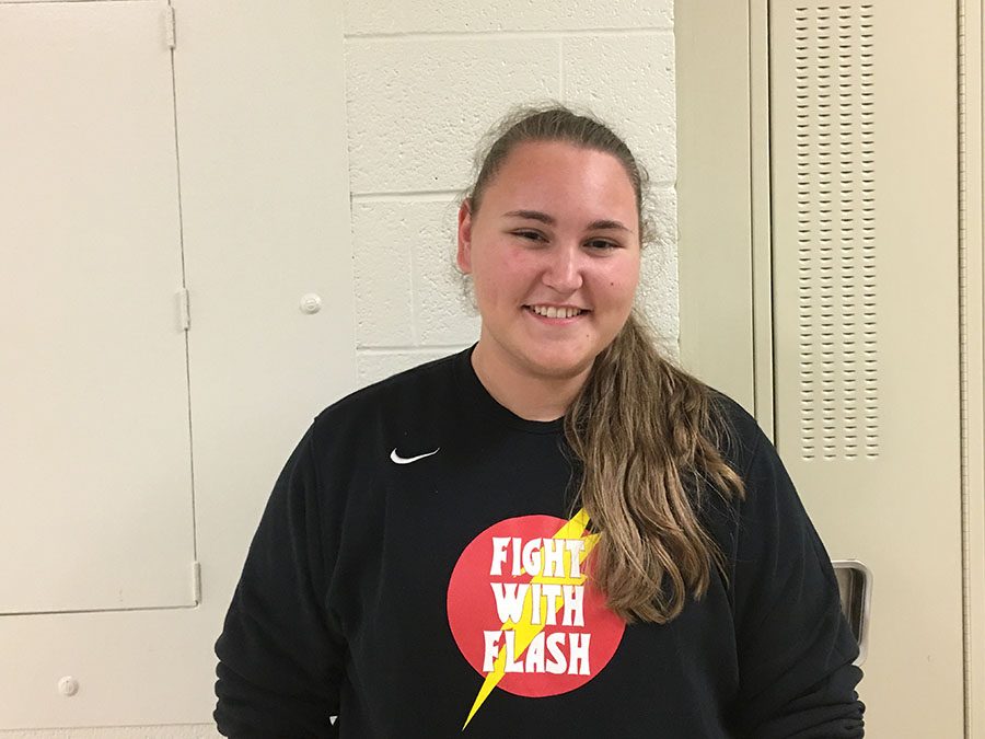 Kara Wagenknecht 19 smiles against a wall on Monday, Sept. 24.