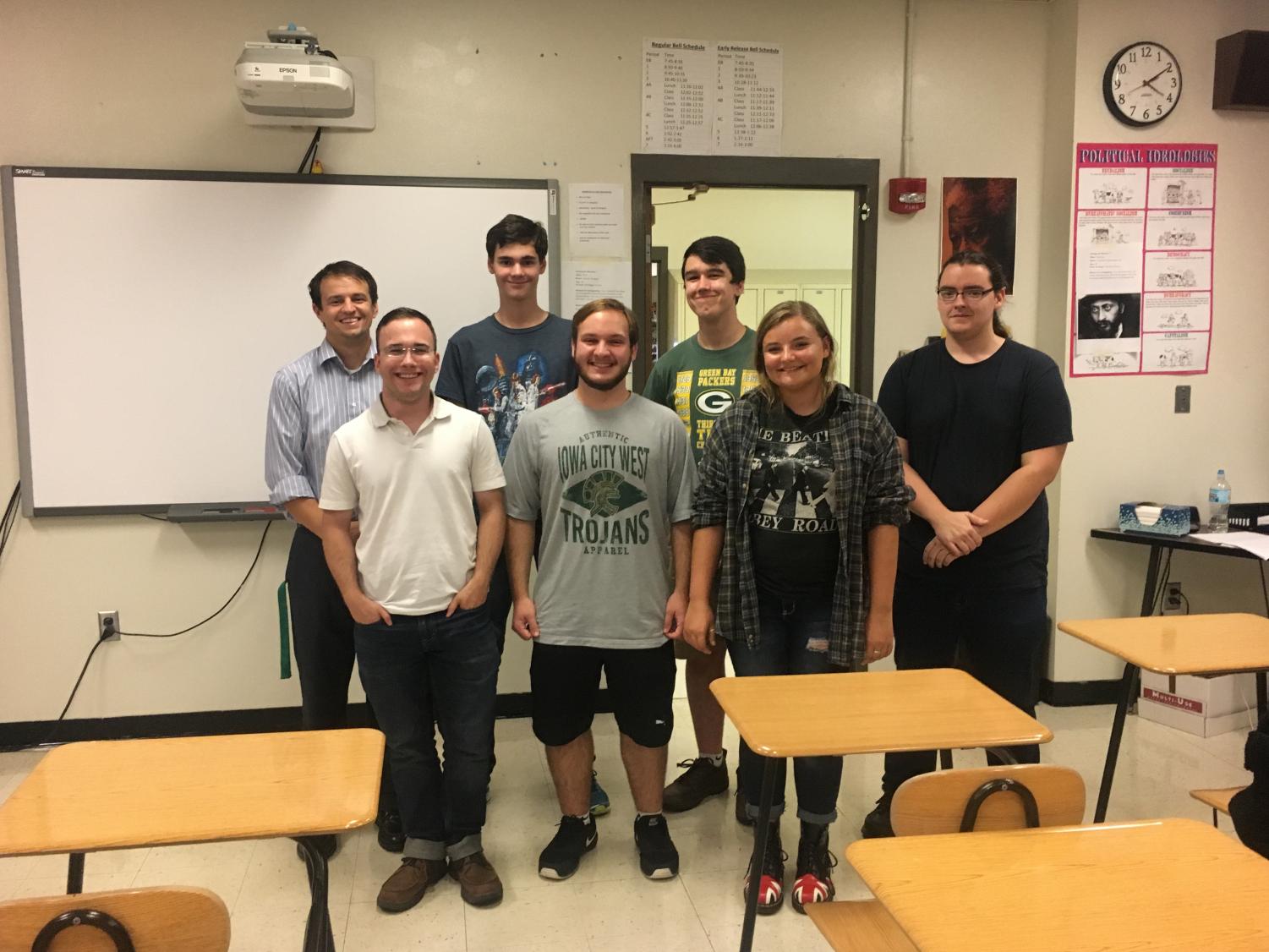The members of Students for Open Discussion gather for a photo. From left to right, back row first: Brendon Aitken, Ronan Smith '20, Danny Rompot '19, Simon Jones '19, Sam Gienapp '19, Logan Pfannebecker '19, Hanna O'Dell '19.