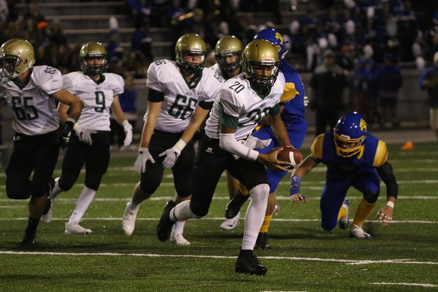 Marcus Morgan '21 runs down the field after not being able to find an open pass on Thursday, Oct. 4.