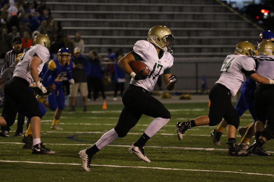 Jalen Gaudet '19 runs towards the end zone on Thursday, Oct. 4.