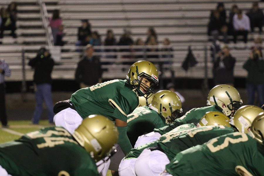 Marcus Morgan '21 decides what play to call as he waits to call for the ball from Marshall Blatz '19 on Friday, Oct. 26.