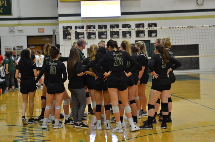 The team gathers for their second timeout of the second set on Tuesday, Oct. 9.