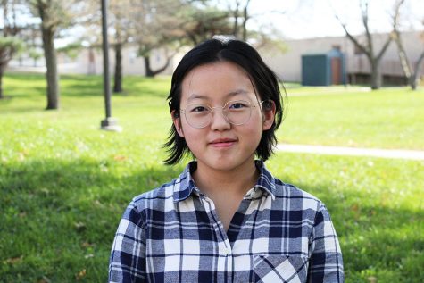 Joy Li 20 smiles for a photo. She will be attending West for only a month before returning to China.