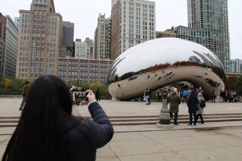 Co-Design Editor Lydia Guo 19 takes a photo of the Bean in Millennium Park during free time while at the convention.