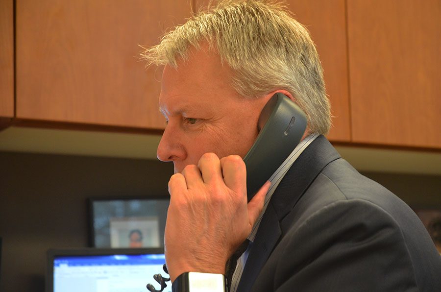 Dr. Shoultz makes a phone call during the middle off the day.