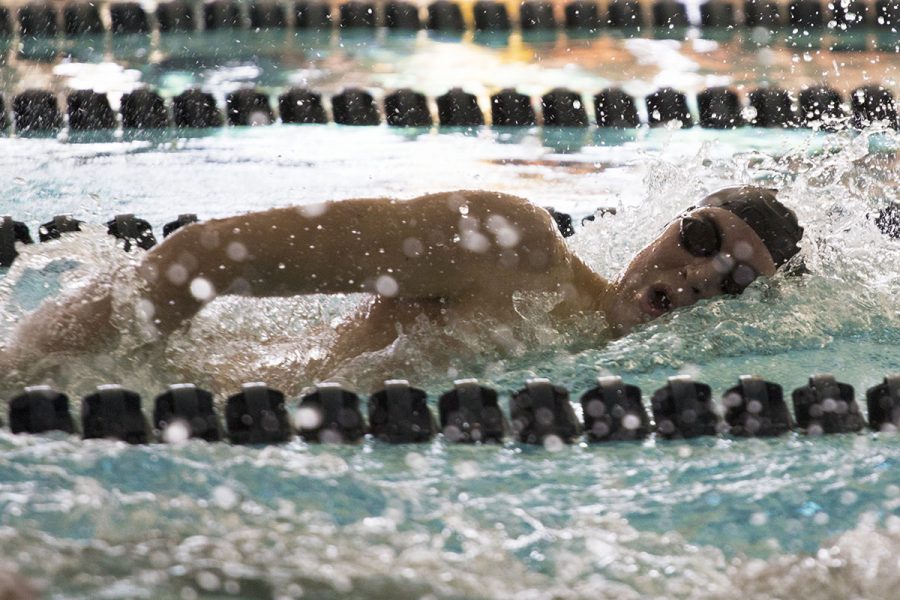 James Pinter 20 competes in the 200 yard freestyle race on Saturday, Dec. 16. Pinter placed third in his heat with a time of 1:46.46.