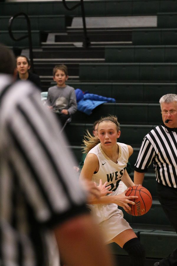 Audrey Koch '21 looks for an open West player to pass the ball to during the second half of the game on Friday, Nov. 30.