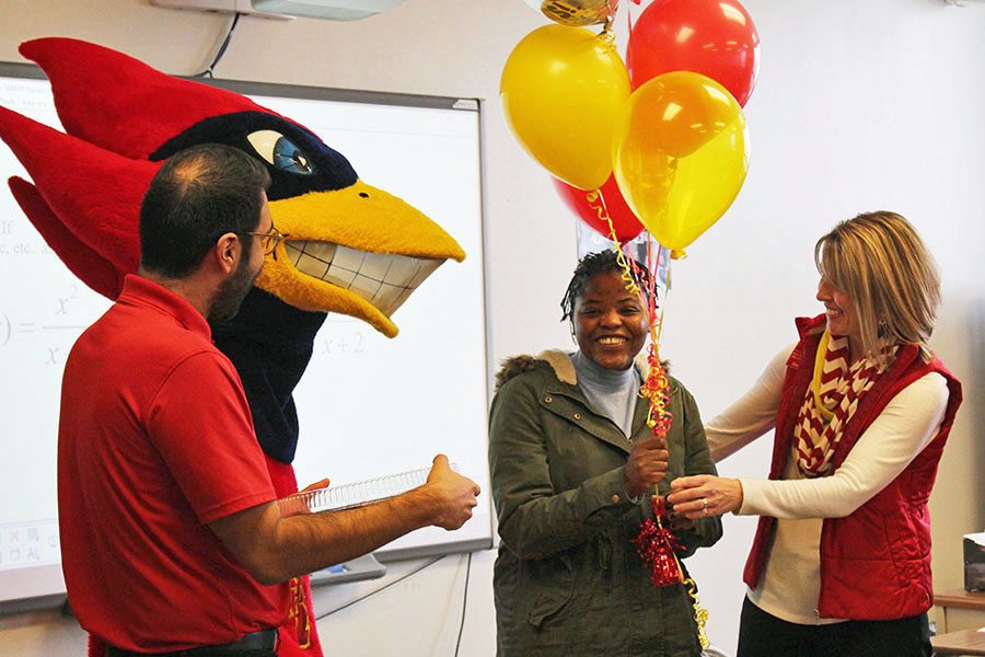 Iowa State University representatives surprise Veronica Kharunda 19 in her pre-calculus class with the news of her acceptance to the university on Monday, Nov. 19.