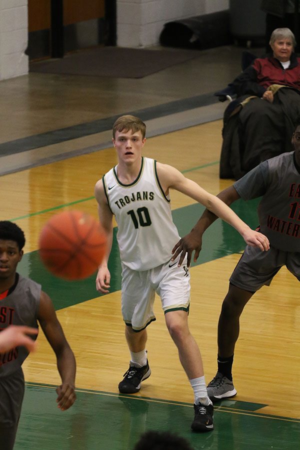 Tate Crane 20 stares down a pass as he gets open during the first half on Tuesday, Jan. 15.