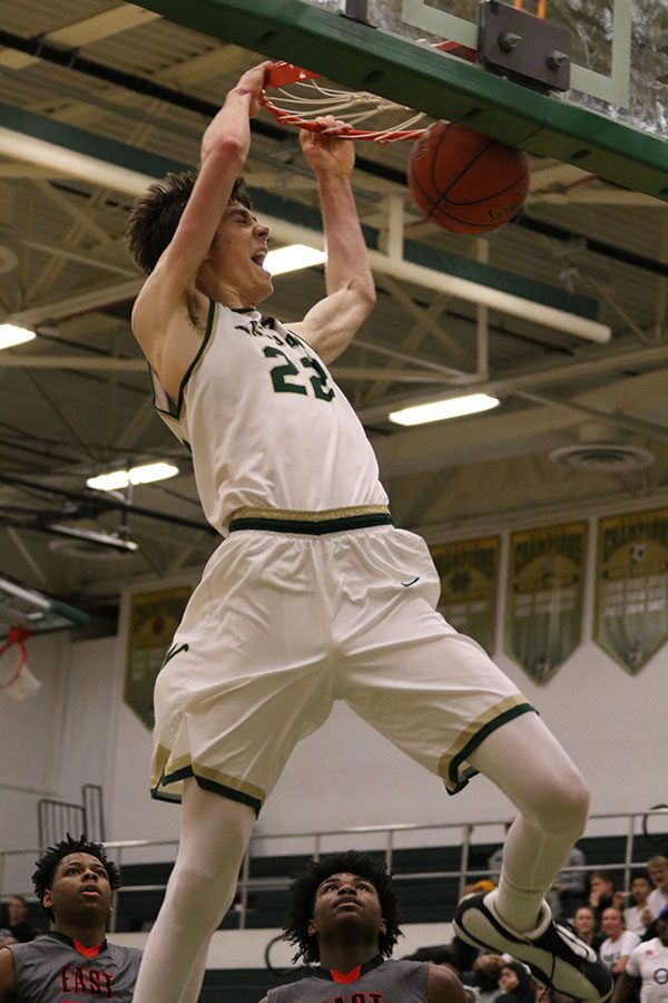 Patrick McCaffery '19 dunks the basketball during the third quarter on Tuesday, Jan. 15. McCaffery led the Trojans with 35 points. 