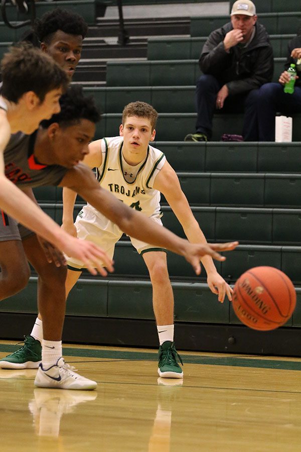 Nick Pepin 20 passes the ball to Patrick McCaffery 19 during the second half on Tuesday, Jan. 15.