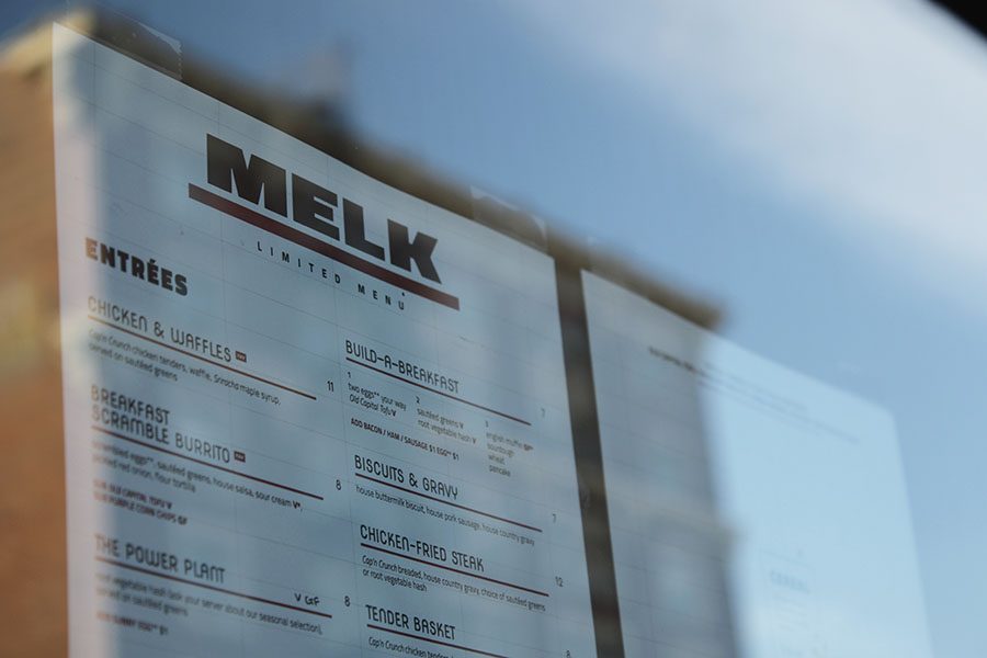 The Melk menu is taped to the windows, so pedestrians can review it before going into the restaurant. 