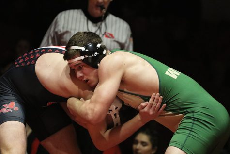 Will Hoeft 20 tries to keep City Highs Joe Ring 19 from escaping on Thursday, Jan. 3. Hoeft pinned Ring in 45 seconds. 