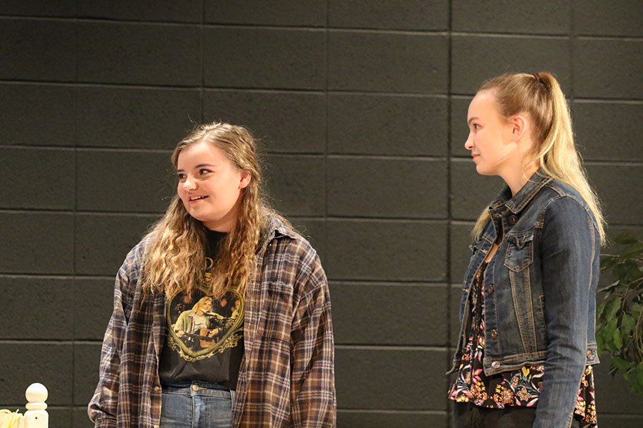 Hanna O'Dell '19 and Teya Kerns '20 stand on stage during the drama play on Thursday, Jan. 10.