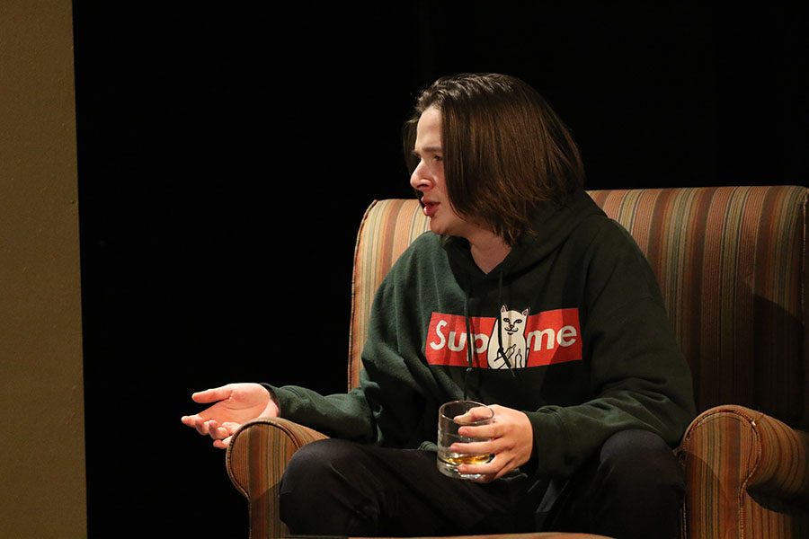 Cyrus Yoder '20 talks to Sean Harken '21 during a scene in the drama play "The end summer" on Thursday, Jan. 10.