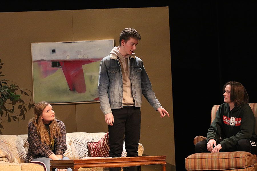 Hanna ODell 19, Sean Harken 21, and Cyrus Yoder 20 perform on stage during the drama play The end summer on Thursday, Jan. 10.