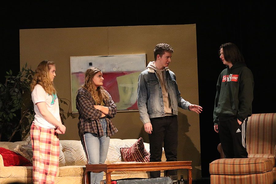 Marijke Nielsen 19, Hanna ODell 19, Sean Harken 21, and Cyrus Yoder 20 debate with each other on stage during the drama play The end summer on Thursday, Jan. 10