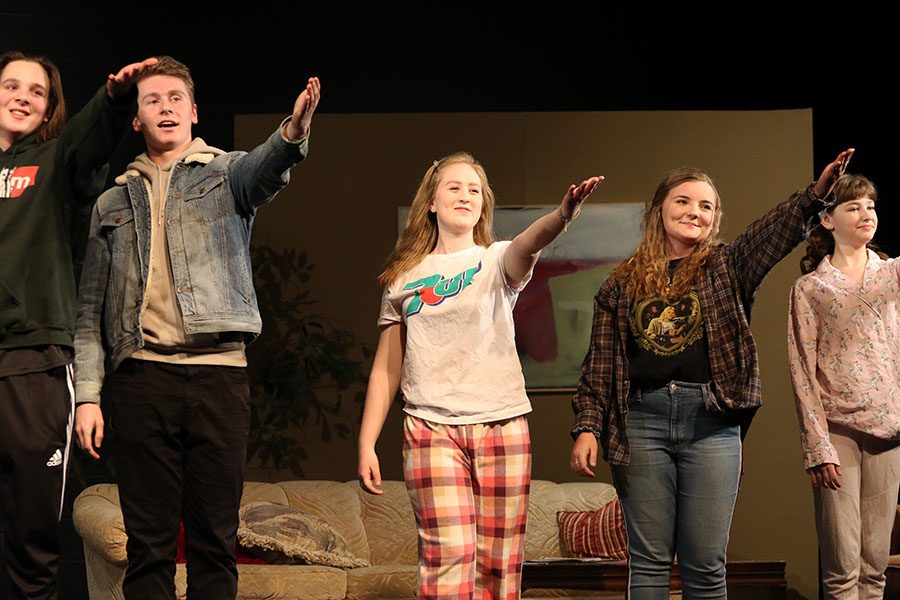 Cyrus Yoder 20, Sean Harken 21, Marijke Nielsen 19, Hannah ODell 19 and Zoe Nolte 22 salute their tech crew at the end of the drama play The end summer on Thursday, Jan. 10.