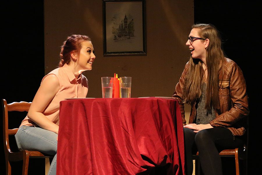 Willa Martin '21 and Carrie Harper '19 perform together during the first scene of the comedy play "It's not you, it's me" on Thursday, Jan. 10.