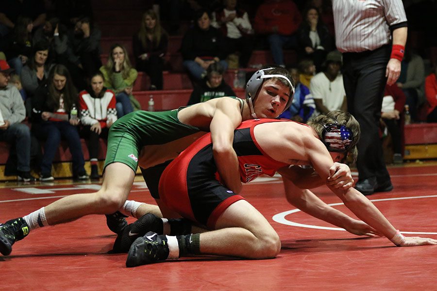 Graham Gambrall 21 takes control over City Highs Paul Wailkel 22. Grambrall pinned Wailkel in 1:16 on Thursday, Jan. 3.