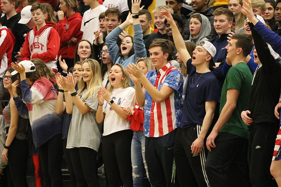 The student section cheers during the first round of regionals for the boys basketball team on Friday, Feb. 22.
