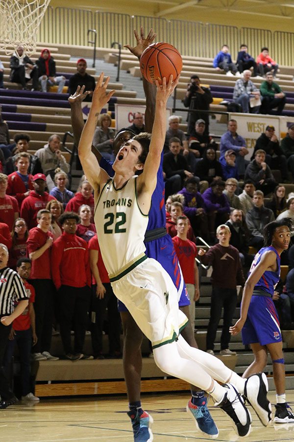 Patrick McCaffery 19 jumps to make a two-point shot as he gets fouled on Tuesday, Feb. 26.