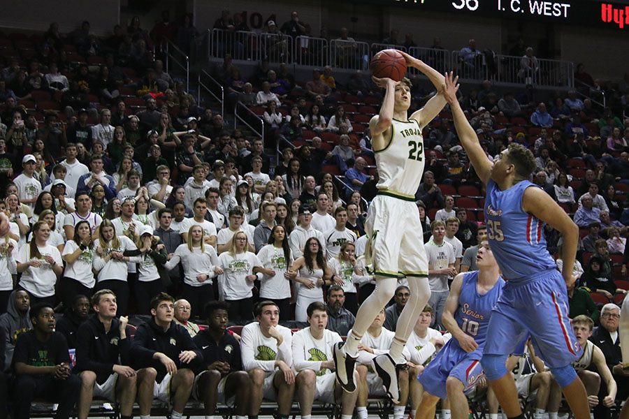 Patrick McCaffery 19 attempts to make the game winning shot against Dubuque Senior on Wednesday, March 6.