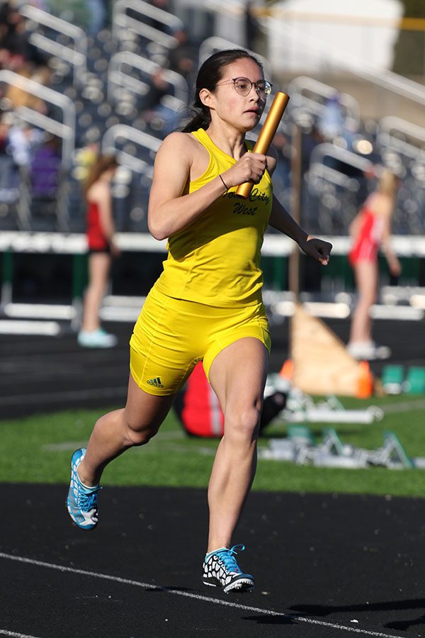 Emma Kearney 21 runs the second leg of the 4x800 meter relay race on Tuesday, March 26. The relay team won with a time of 9.52.96.