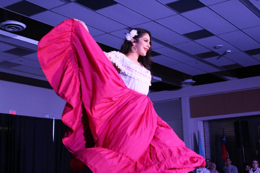 Mayela Pelayo 18 spins on stage to show off her skirt as she models during the Latin American section of the show on Saturday, March 9.