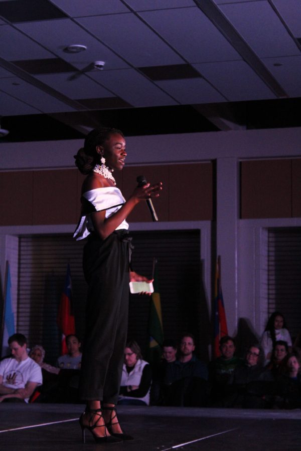 Prisca Namutchibwe 20 performs her original poem as a special act during Walk it Out on Saturday, March 9. In the poem, she asks white parents to tell their children about all of Africa, not just the bad. Her poem also discusses her learning about European culture and history before her own in school.