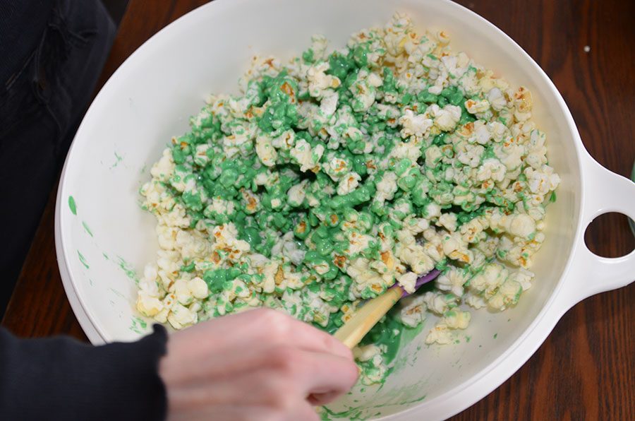 Mix the candy melts with the popcorn and you are almost done. 