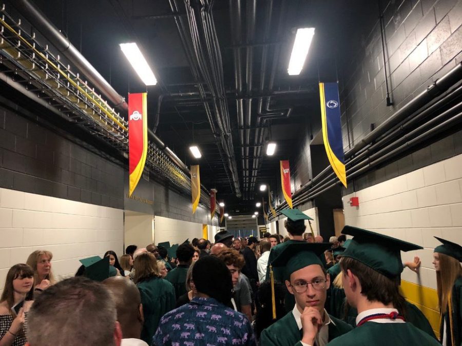 Students and attendees gather in the tunnels of Carver Hawkeye Arena to take shelter.