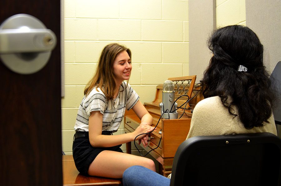 Alex Carlon '21 and Aditi Borde '21 discuss their tiny room podcast.