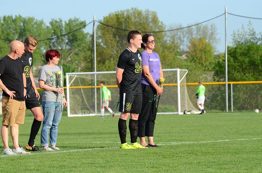 Val Trussov '19 is accompanied by West's athletic trainer, Shelia Stiles.