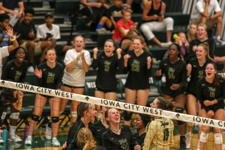 Raina Pfeifer '22 smiles after she tipped the ball for a point on Tuesday, August 27 during the Battle for the Spike.