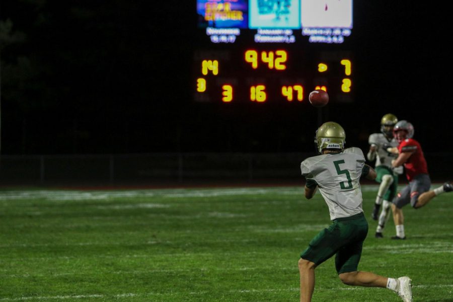 Ian McAreavy ‘21 catches a third down pass during a game against North Scott on Aug. 30.