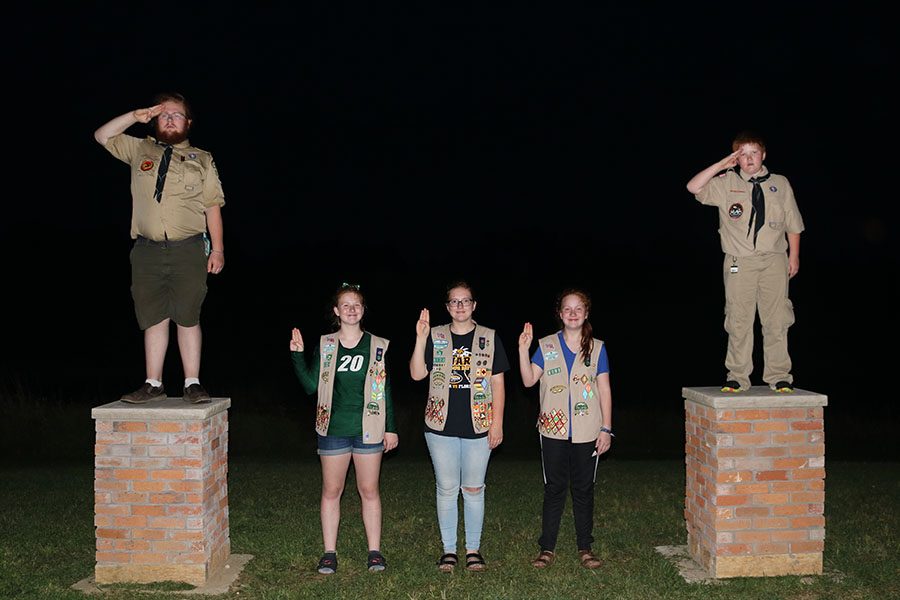 All of the younger Schmidt-Rundell kids doing their individual scout salutes. 