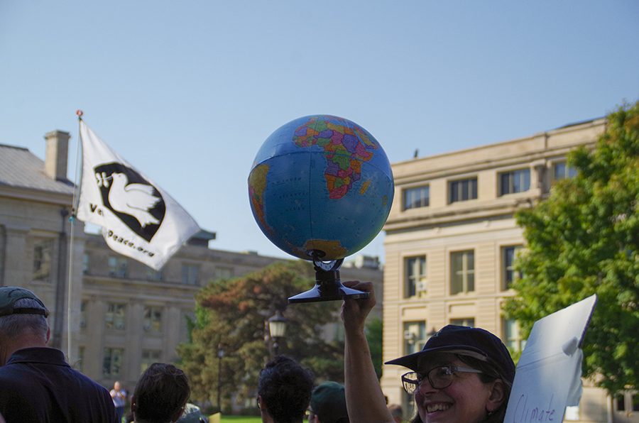 Participants marched from City Hall to the Pentacrest to call attention to the importance of climate awareness.