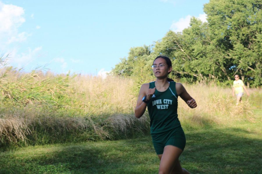 Emma Kearney 21, runs at the first and only home meet of the season.
