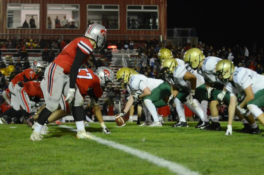 The offensive line sets up before a play against City High in the Battle for the Boot at Bates Field on Oct. 25.