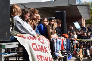 Greta Thunberg sits alongside students activists during the silent 11 minute sit down. 