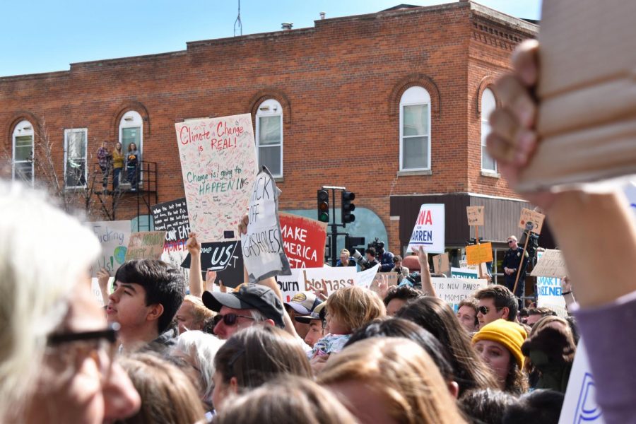 Hundreds of people from across Iowa gather at the intersection between North Dubuque Street and Iowa Avenue, to witness Greta Thunberg speak at the climate strike. 