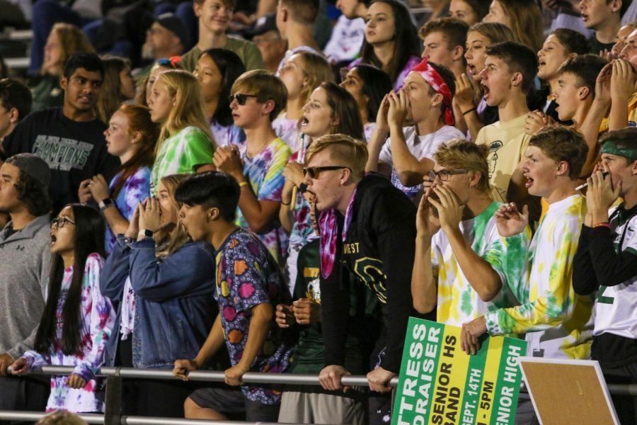 Even Brauns '20 and the student section prepare for the kickoff at the football home opener against Bettendorf on Sept. 6.