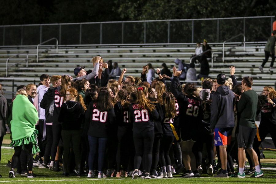 The seniors celebrate their 22-16 win over the juniors during West Highs annual powderpuff game on Oct. 3, 2019. 