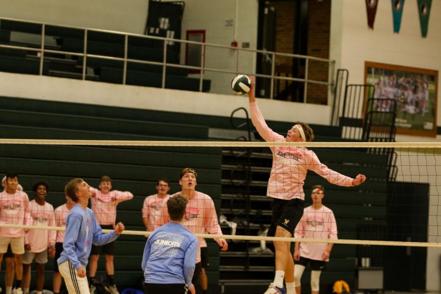 Ben Vander Leest '20 spikes the ball over two junior defenders during West High's annual man ball game on Oct. 3rd. 