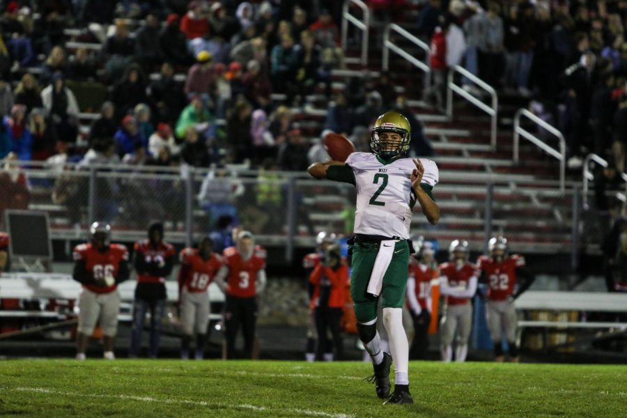 Marcus Morgan '21 throws his 11th touchdown pass of the season to Grahm Goering '21 in the fourth quarter of the Battle for the Boot at Bates Field on Oct. 25.