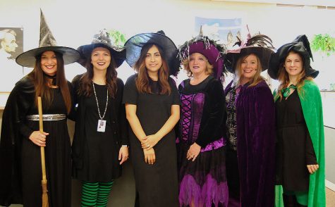 The secretaries of West High pose as witches this Halloween. All the departments do their own thing, so we have to do it too, says Brianna Dusterhoft, Athletic Secretary.