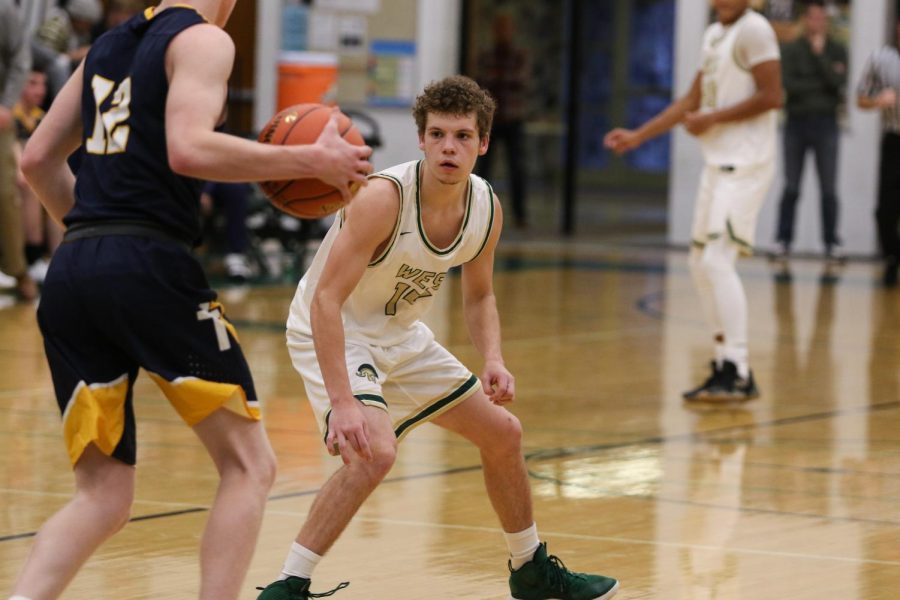 Nick Pepin '20 eyes the ball as he pressures the Regina point guard during a scrimmage on Nov. 30. 